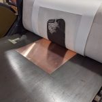 registered and wound through the press
